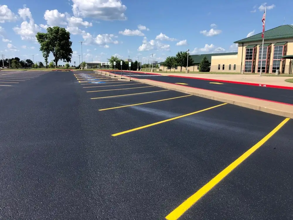 Red and yellow curb striping carried along a building frontage